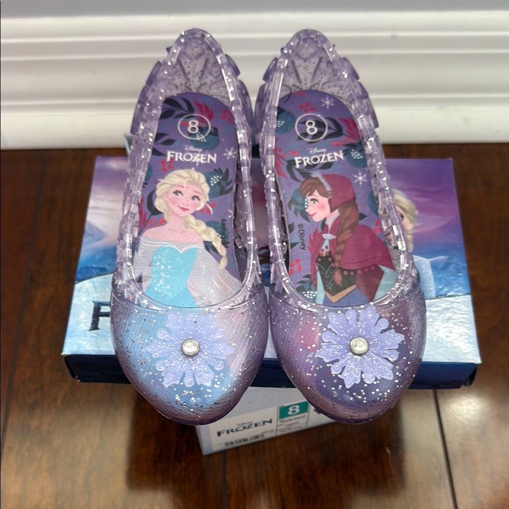 Frozen themed light up wedge jelly shoes.
